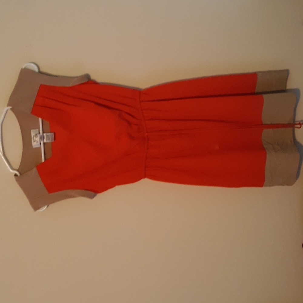 A Cream and Orange Dress